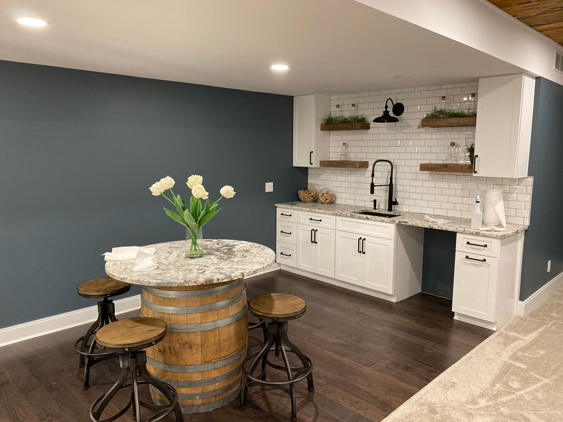 A basement wet bar with Cypress Wood accents