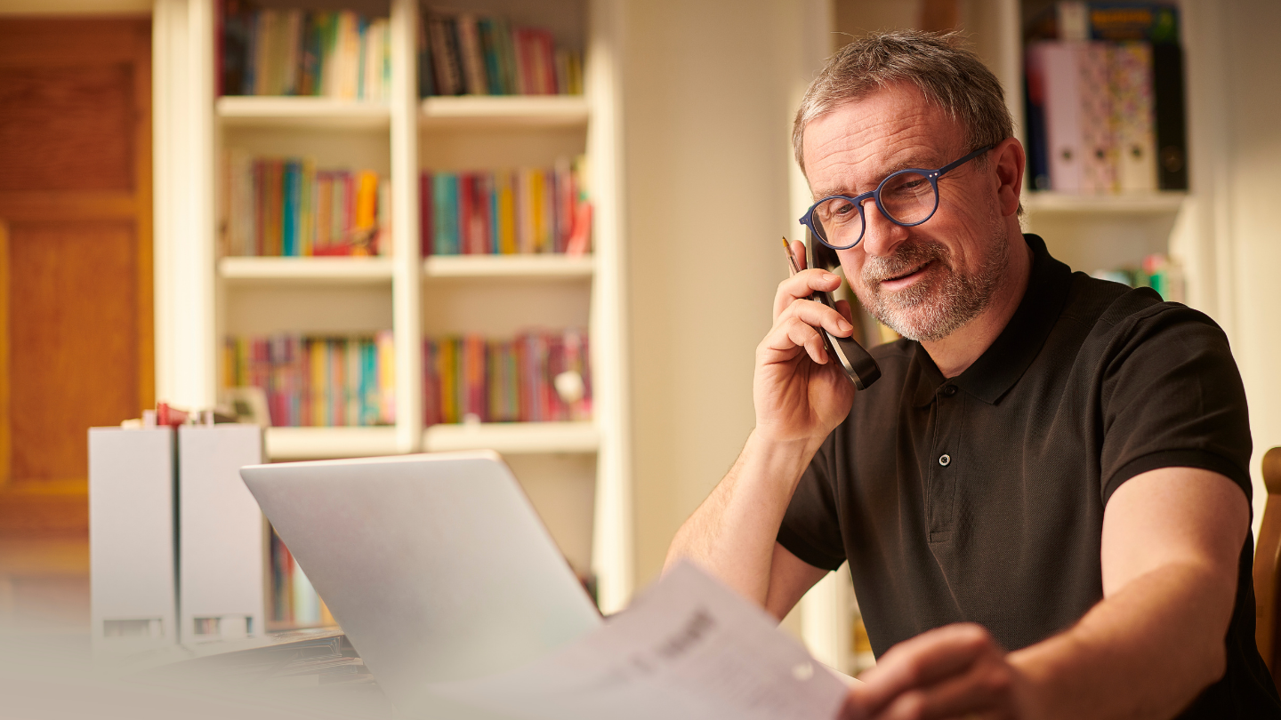 Landlord reviewing financials to maximize ROI on multifamily investments in Detroit